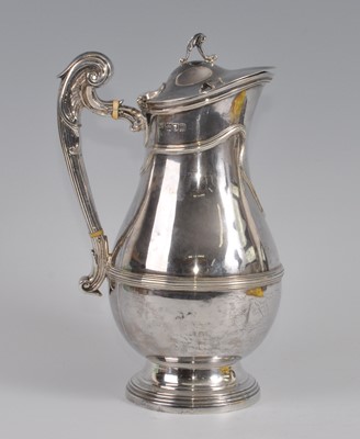 Lot 1099 - An Edwardian silver hot milk pot, of banded...