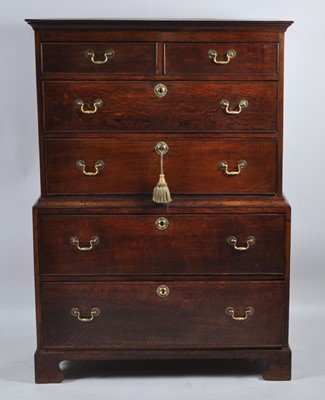 Lot 1442 - An antique joined oak chest-on-chest, 18th...