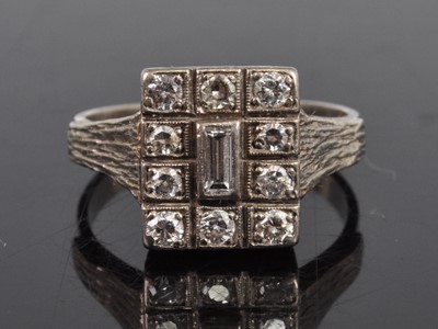 Lot 1188 - A white metal diamond rectangular cluster ring,...