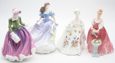 Lot 8 - A collection of four Royal Doulton figurines,...