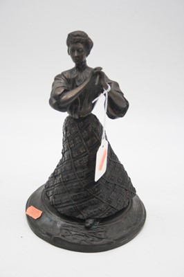 Lot 36 - A reproduction bronze figure of a female in...