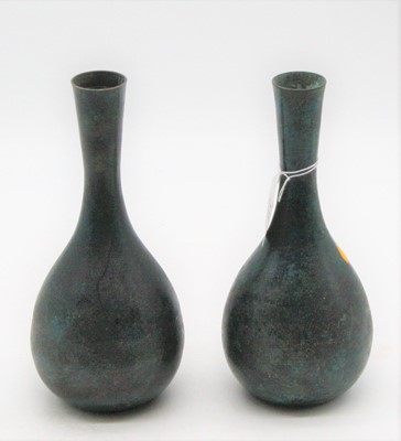 Lot 110 - A pair of bronze alloy vases, each having a...