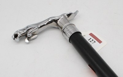 Lot 127 - A walking stick having an ebonised shaft with...