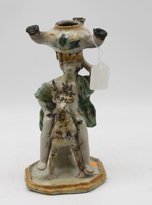 Lot 154 - A 19th century continental glazed pottery oil...