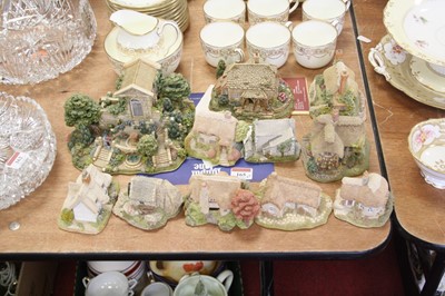 Lot 165 - A collection of cottage ornaments, to include...