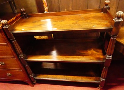 Lot 1267 - A Victorian mahogany three-tier buffet, having...