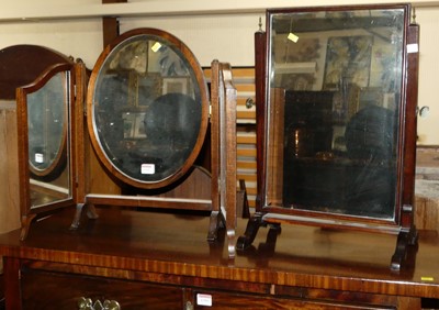 Lot 1392 - A mahogany triptych dressing mirror, together...