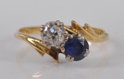 Lot 2501 - An 18ct yellow and white gold, sapphire and...
