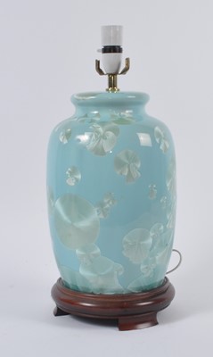 Lot 17 - A 20th century blue glazed porcelain table...