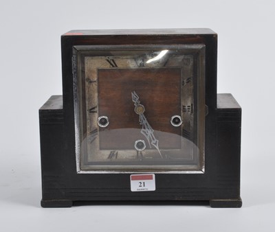 Lot 21 - An Art Deco Enfield oak cased eight-day mantel...