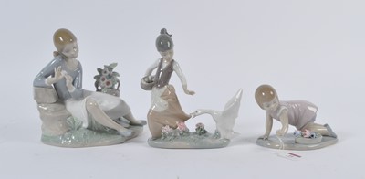 Lot 24 - A Lladro porcelain figure of a young girl,...