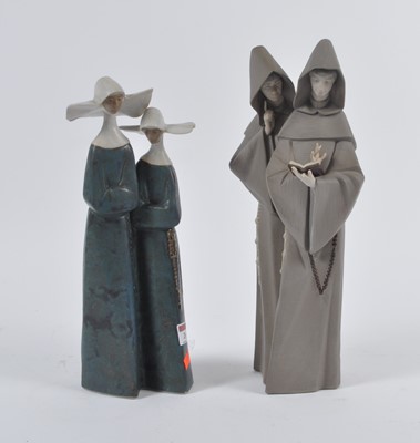 Lot 26 - A Lladro mottle glazed figure group of two...