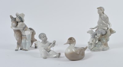 Lot 35 - A Lladro porcelain figure of a young shepherd;...