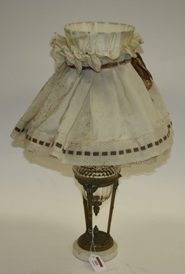 Lot 101 - A 19th century brass oil lamp, having facet...