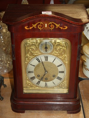 Lot 98 - A 20th century mahogany cased eight-day mantel...