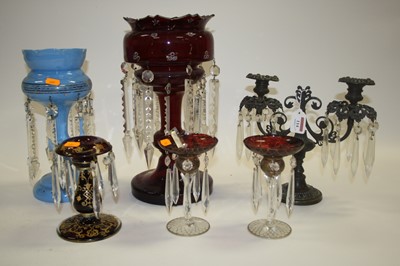 Lot 114 - A Victorian cranberry glass table lustre,...