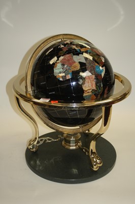 Lot 145 - A polished hardstone inlaid terrestrial globe,...