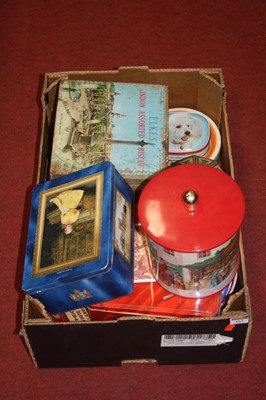 Lot 163 - A collection of tins; together with two wall...