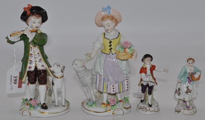 Lot 199 - Four Sitzendorf hard paste porcelain figures,...