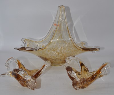 Lot 208 - A large Italian amber tinted glass table...