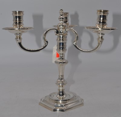Lot 229 - An Elizabeth II silver three-branch table...