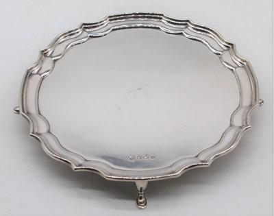 Lot 238 - An Elizabeth II silver waiter, having...
