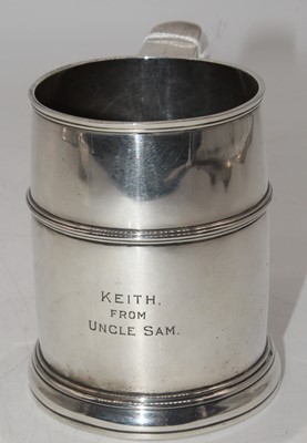 Lot 267 - A George V silver tankard, having ancone...