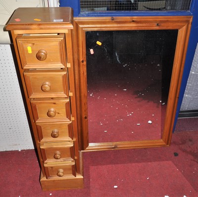 Lot 1154 - A narrow pine chest of six long drawers,...