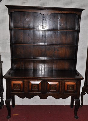 Lot 1155 - A joined oak Welsh dresser, having three-tier...