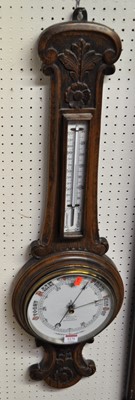 Lot 1171 - An early 20th century floral relief carved oak...