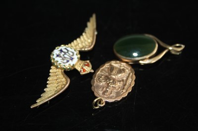 Lot 402 - An RAF yellow metal and enamel set wings...