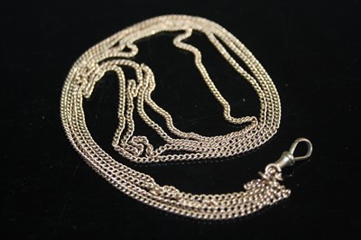 Lot 403 - A 9ct gold flat curblink long guard chain,...
