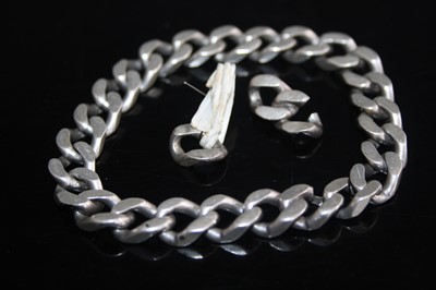 Lot 405 - A gent's heavy white metal flat curblink...