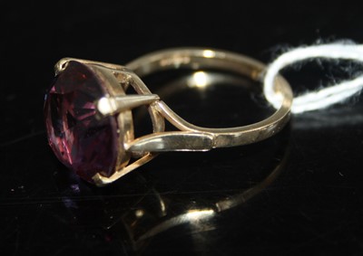 Lot 425 - A modern 9ct gold and amethyst set dress ring,...