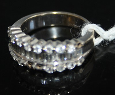 Lot 428 - A contemporary 18ct white gold diamond half...