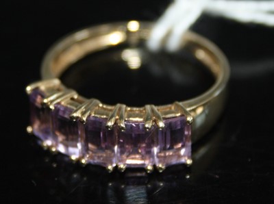 Lot 429 - A modern 9ct gold amethyst set half hoop ring,...