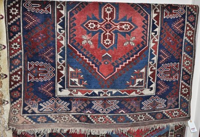 Lot 1205 - A Persian woollen blue ground Tabriz rug, 200...