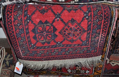 Lot 1207 - Four various very small Persian red and blue...