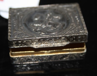 Lot 446 - A sterling silver pill box decorated with St...