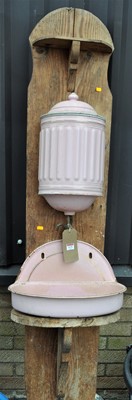 Lot 1172 - An enamelled metal and pine backed French wall...