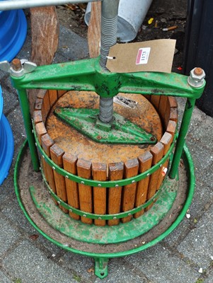 Lot 1173 - A green painted cast iron and slatted oak...