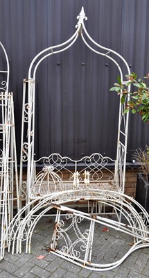 Lot 1178 - A cream painted tubular metal lancet arched...