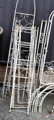 Lot 1179 - Two pairs of painted tubular metal garden rose...