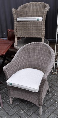 Lot 1180 - A contemporary wicker circular garden table,...