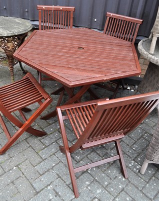 Lot 1181 - A stained and slatted wood hexagonal X frame...