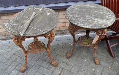 Lot 1182 - A pair of cast iron base and faded wood top...