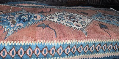 Lot 1220 - A small Persian woollen hall rug, 91.5 x 57cm