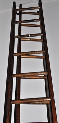 Lot 1225 - A stained pine and metal bound 14 tread...