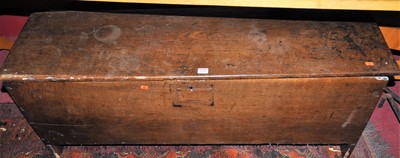 Lot 1228 - An 18th century oak six plank hinge top...