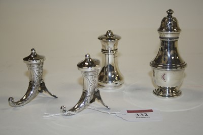 Lot 332 - A pair of unusual sterling pepper-shakers,...